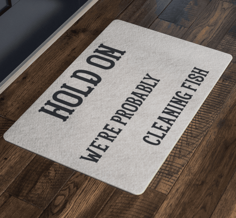 Image of Hold On We're Probably Cleaning Fish | Solid Color Background Doormat 