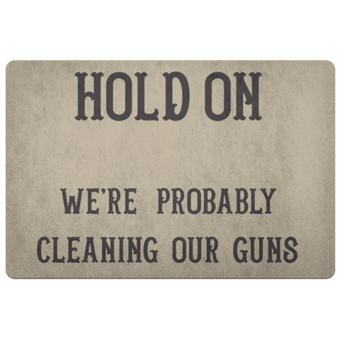 Image of Hold On - We're Probably Cleaning Our Guns Doormat Khaki