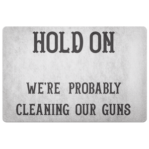 Hold On - We're Probably Cleaning Our Guns Doormat White 