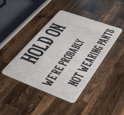 Image of Hold On We're Probably Not Wearing Pants, 4 Colors Doormat 