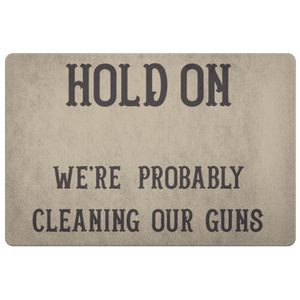 Hold On - We're Probably Cleaning Our Guns Doormat Khaki 